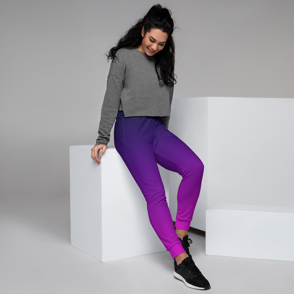 woman wearing a purple joggers, posing model, right side