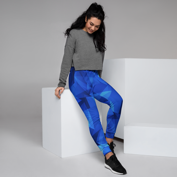 woman wearing blue fragments joggers, posing model, right side