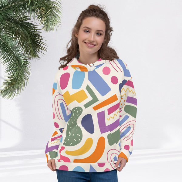 woman wears a colourful hoodie with shapes front side