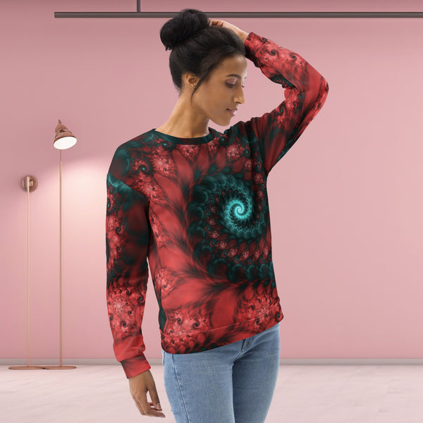 woman wears a red sweatshirt with fractal spirals, front side