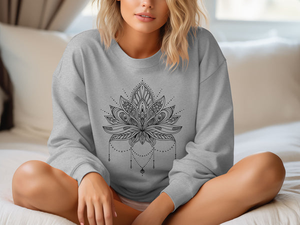 woman wears a premium grey sweatshirt with lotus