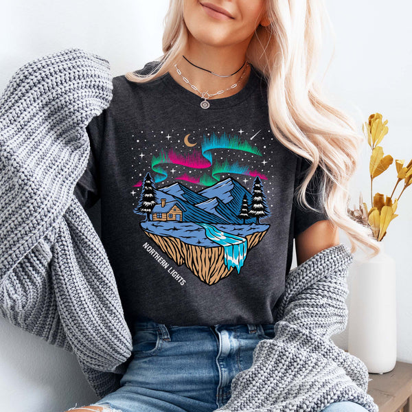 woman wearing a grey t-shirt with Northern Lights