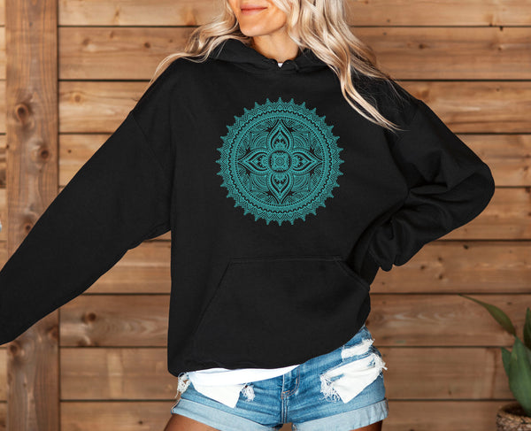 woman wearing a black hoodie with mint mandala