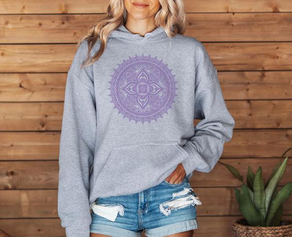 woman wearing a grey hoodie with violet mandala