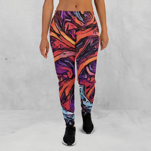 woman wearing a colorful joggers with red mountains design, front side